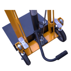 Close-up of a hydraulic lift cart's base, featuring a black platform, yellow frame, and foot pedal for operation.