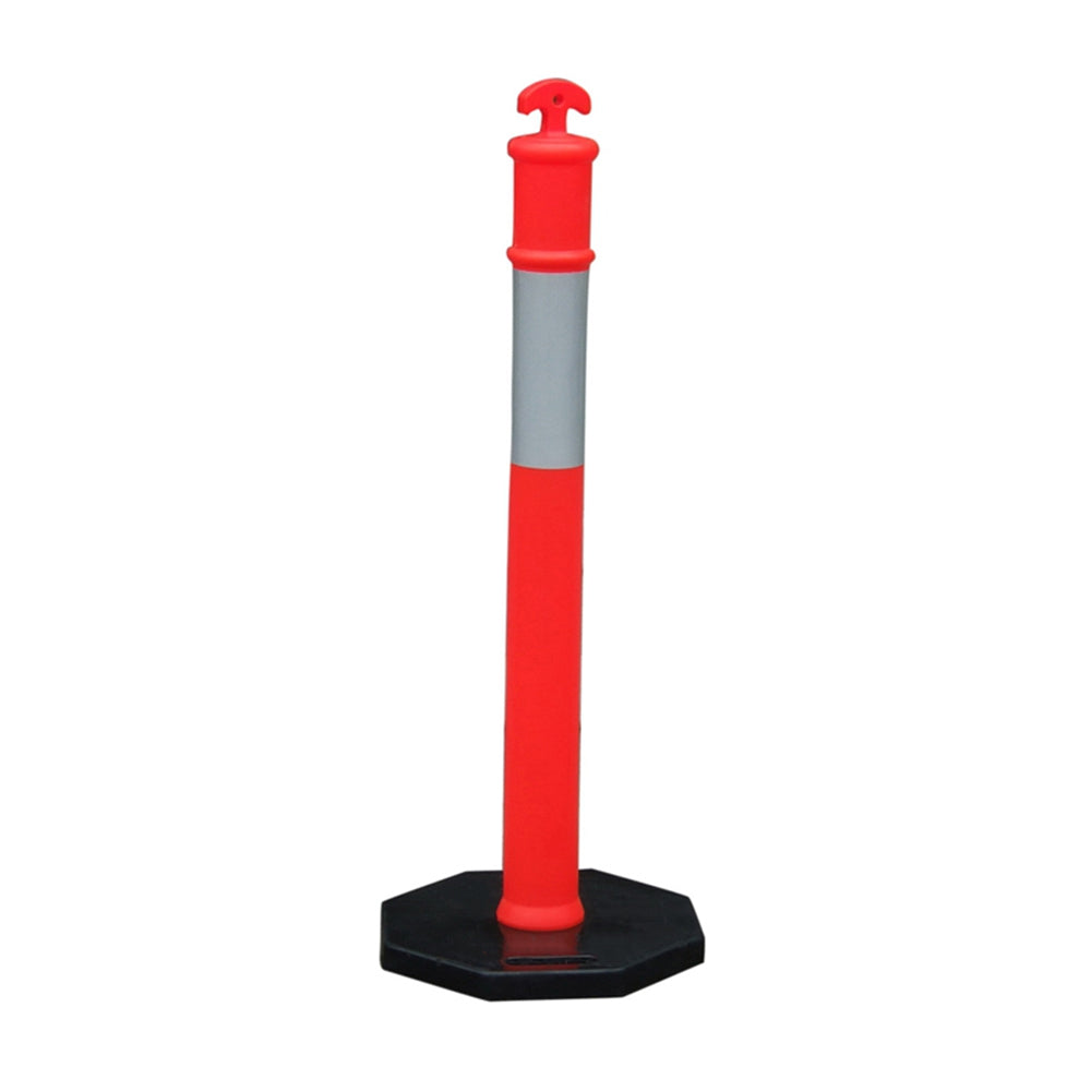 A bright red traffic bollard with a gray stripe, mounted on an octagonal black base, used for road safety and direction.