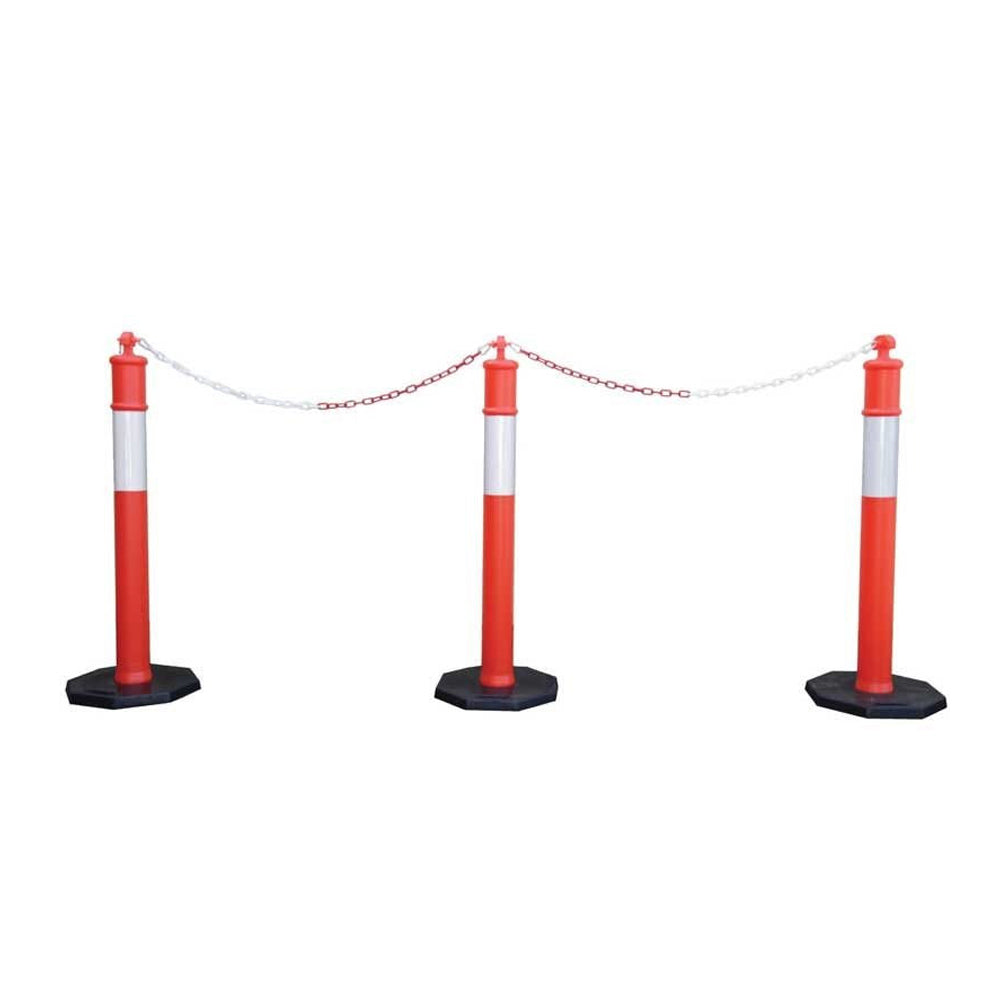 Three red and white traffic bollards connected by a chain, set on black octagonal bases, used for crowd control or road blocking.