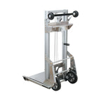 A compact, silver foldable hand truck with two large rear wheels and sturdy frame, designed for easy transportation of heavy items.