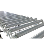 Close-up view of metal rollers on an expandable conveyor system.