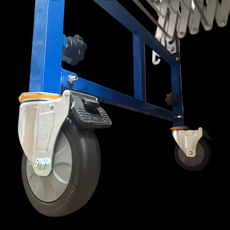 Close-up of a blue flexible conveyor's swivel caster with a locking brake, showing sturdy metal frame and adjustment knobs.