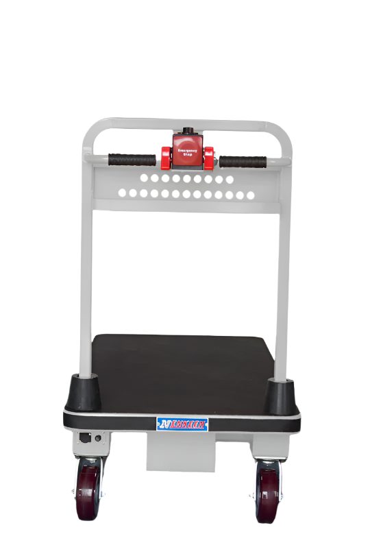 Back view of a motorized platform cart with a black flatbed, silver handle, red emergency stop button, and visible wheels.
