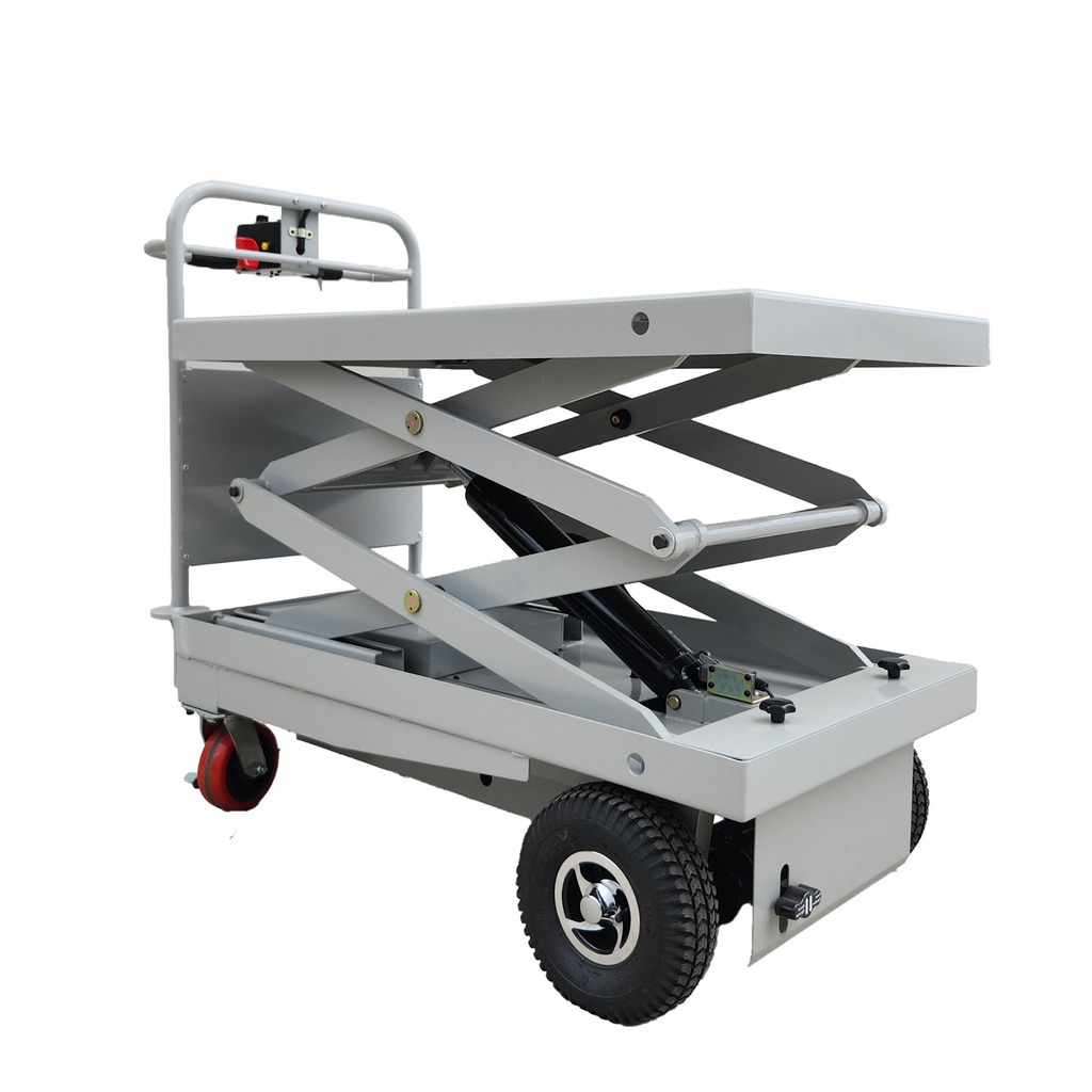 A gray scissor lift table with a raised platform, featuring four wheels for mobility and a handle for operation.