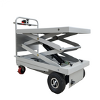 A gray scissor lift table with a raised platform, featuring four wheels for mobility and a handle for operation.