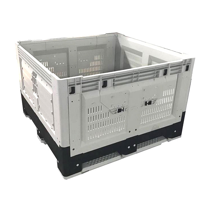 A large, stackable plastic storage crate with vented sides, featuring a black base and white frame, ideal for transporting goods.