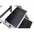 Close-up of a step ladder's rubberized treads, featuring the embossed text "LITTLE MONSTAR" on the steps.