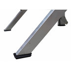 Close-up of a metallic table leg featuring a rubber foot for stability, set against a clean white background.