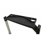 Black plastic tray with holes for tools or paint cups, attached to a lightweight metal frame, angled view.