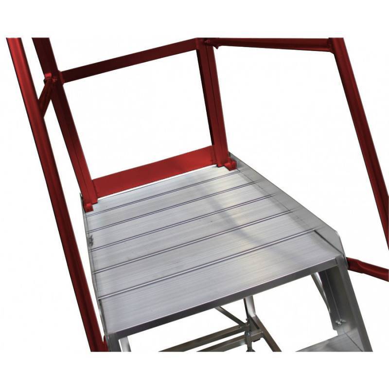 Close-up of an aluminum ladder platform with red railings, featuring a textured surface for grip and stability.