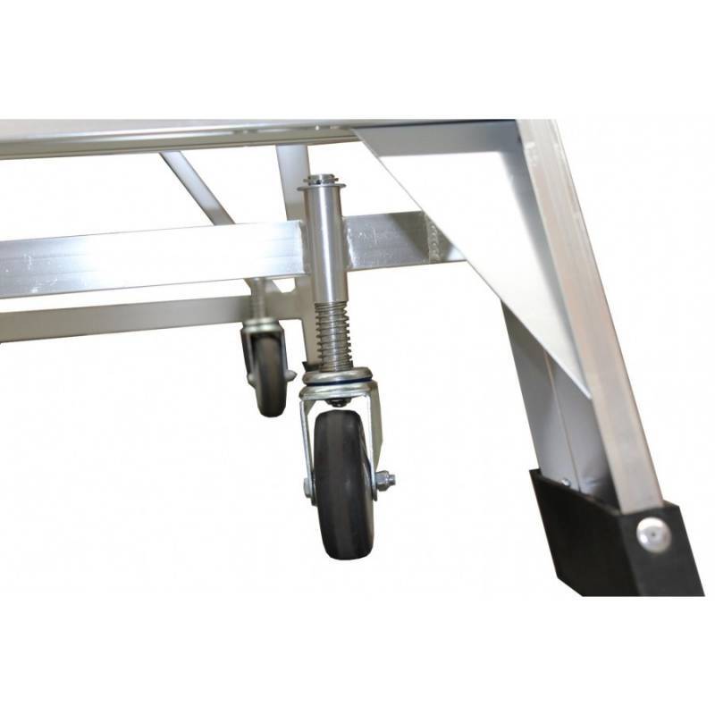 Close-up view of an adjustable wheel assembly on a metal frame, showcasing smooth-rolling caster wheels and a spring mechanism.