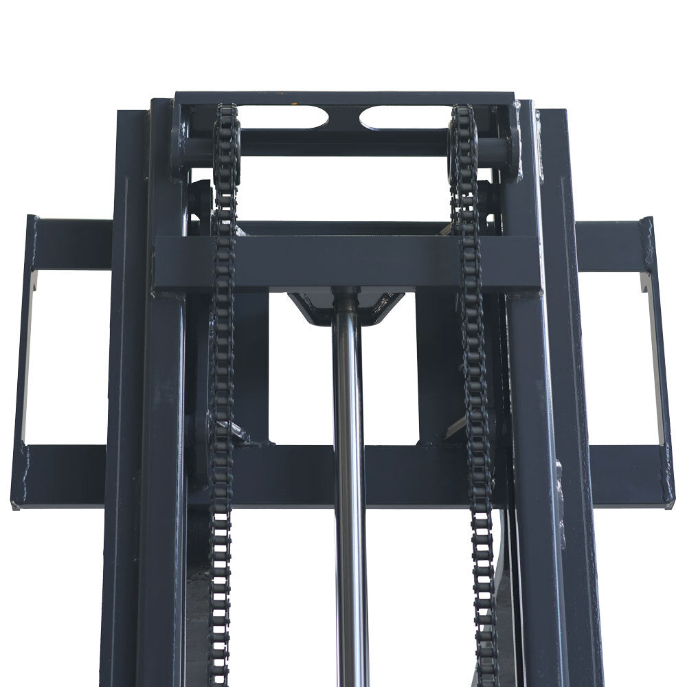 Close-up view of a forklift's mast, featuring chains and hydraulic components for lifting heavy loads.