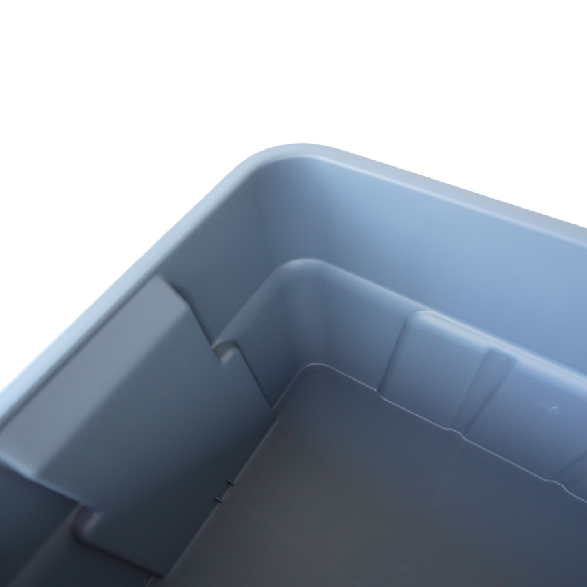 Close up of the inside corner of a grey storage container showing the smooth rounded edge.