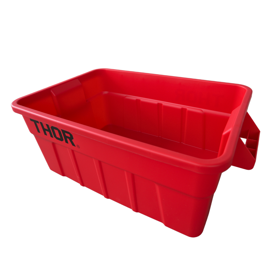 Side view of a large red storage container with the lid off, side handles for easy grip and "Thor" logo displayed.