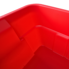 Close up of the inside corner of a red storage container showing the smooth rounded edge.
