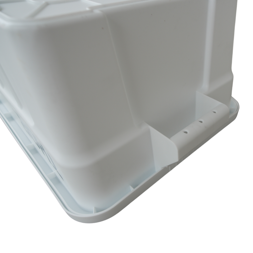 Close of of an upside down white storage container showcasing the underneath of the handle grip.