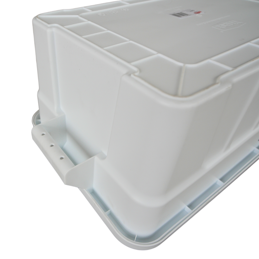 Close of of an upside down white storage container showcasing the underneath of the handle grip.