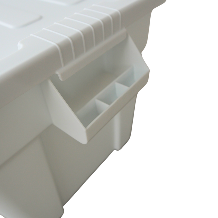 Close-up of a white plastic storage container with a built-in handle.
