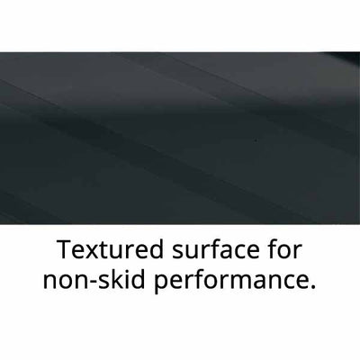 Close-up of a textured black surface designed for enhanced non-skid performance, promoting safety and grip.
