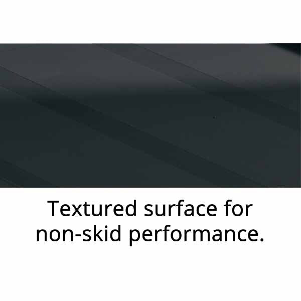 Close-up of a textured black surface designed for enhanced non-skid performance, promoting safety and grip.