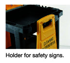 Yellow "Cleaning in Progress" safety sign attached to a black cart, designed for storing and displaying safety information.