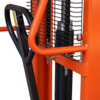 Close-up of a pallet stacker, focusing on the handle, illustrating the equipment's design and ergonomic features.