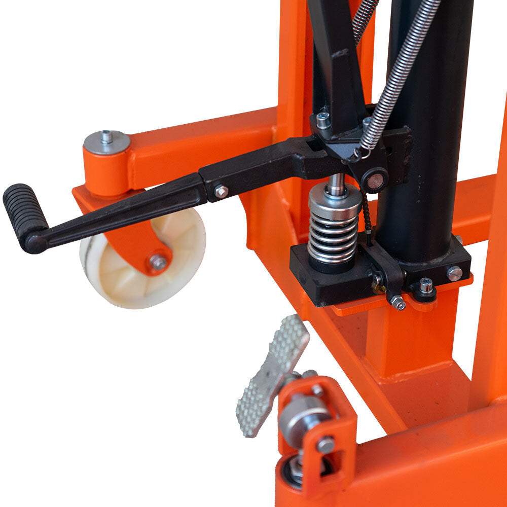 Close-up of an orange hydraulic lift mechanism with a manual foot pedal, spring, and caster wheel.