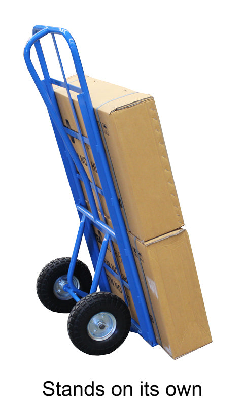 A blue hand truck upright with two stacked cardboard boxes, demonstrating its stability and ability to stand on its own.