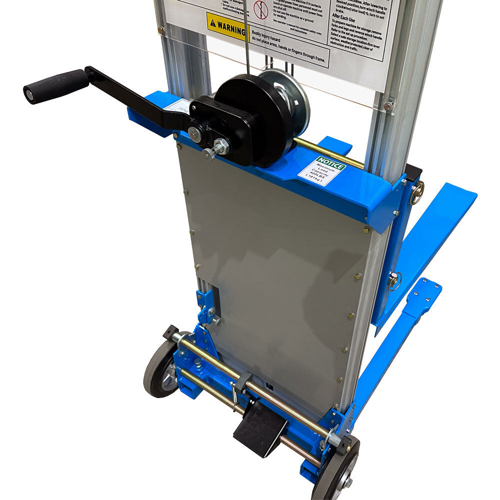 A close-up of a blue manual hoist with a hand crank, pulley system, and wheels, designed for lifting and transporting heavy items.