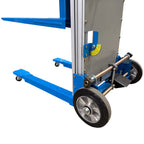 Close-up of a blue trolley with two large sturdy wheels and a platform, designed for transporting heavy items efficiently.
